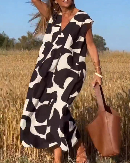 SITA – Printed Dress with V-Neckline